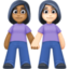 women holding hands: medium-dark skin tone, light skin tone on Facebook