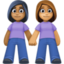 women holding hands: medium-dark skin tone, medium skin tone on Facebook