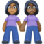 women holding hands: medium-dark skin tone, dark skin tone on Facebook