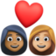 couple with heart: woman, woman, medium-dark skin tone, medium-light skin tone on Facebook