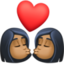 kiss: woman, woman, medium-dark skin tone on Facebook