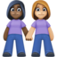 women holding hands: dark skin tone, medium-light skin tone on Facebook