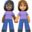 women holding hands: dark skin tone, medium skin tone on Facebook