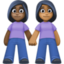 women holding hands: dark skin tone, medium-dark skin tone on Facebook