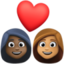 couple with heart: woman, woman, dark skin tone, medium skin tone on Facebook