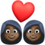 couple with heart: woman, woman, dark skin tone on Facebook