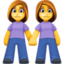 women holding hands on Facebook