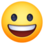 grinning face on Facebook