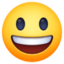 grinning face with big eyes on Facebook