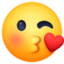 face blowing a kiss on Facebook