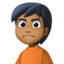 person frowning: medium-dark skin tone on Facebook