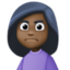 woman frowning: dark skin tone on Facebook