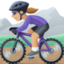woman mountain biking: medium-light skin tone on Facebook