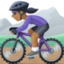woman mountain biking: medium-dark skin tone on Facebook