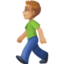 man walking: medium-light skin tone on Facebook