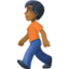 person walking: medium-dark skin tone on Facebook