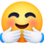 smiling face with open hands on Facebook
