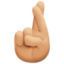 crossed fingers: medium-light skin tone on Facebook