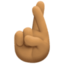 crossed fingers: medium skin tone on Facebook