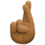 crossed fingers: medium-dark skin tone on Facebook