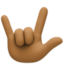 love-you gesture: medium-dark skin tone on Facebook