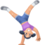 woman cartwheeling: light skin tone on Facebook