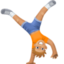 person cartwheeling: medium-light skin tone on Facebook