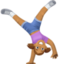woman cartwheeling: medium skin tone on Facebook