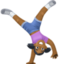 woman cartwheeling: medium-dark skin tone on Facebook