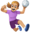 woman playing handball: medium-light skin tone on Facebook