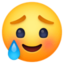 smiling face with tear on Facebook