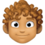 person: medium skin tone, curly hair on Facebook