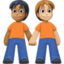 people holding hands: medium-dark skin tone, medium-light skin tone on Facebook