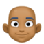 person: medium-dark skin tone, bald on Facebook