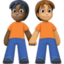 people holding hands: dark skin tone, medium skin tone on Facebook