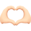 heart hands: light skin tone on Facebook