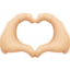 heart hands: medium-light skin tone on Facebook