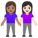 women holding hands: medium skin tone, light skin tone on Google