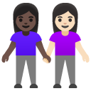 women holding hands: dark skin tone, light skin tone on Google