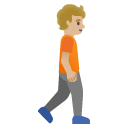 person walking facing right: medium-light skin tone on Google