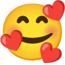 smiling face with hearts on Google