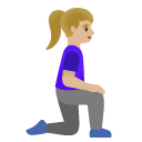 woman kneeling facing right: medium-light skin tone on Google