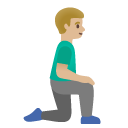 man kneeling facing right: medium-light skin tone on Google