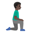 man kneeling facing right: dark skin tone on Google